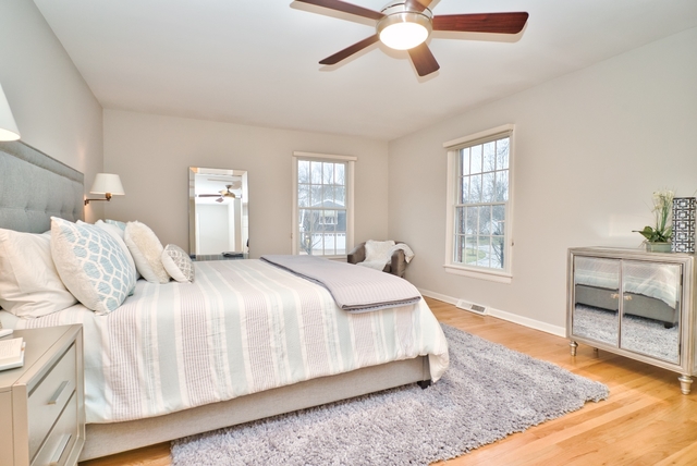 4052 Michelline Lane Northbrook, IL 60062 - Photo 27 of 44 a bedroom with a bed and a window