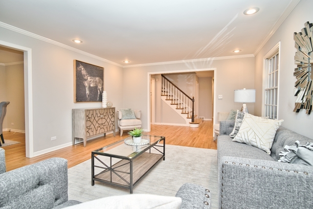 4052 Michelline Lane Northbrook, IL 60062 - Photo 4 of 44 a living room with furniture and wooden floor