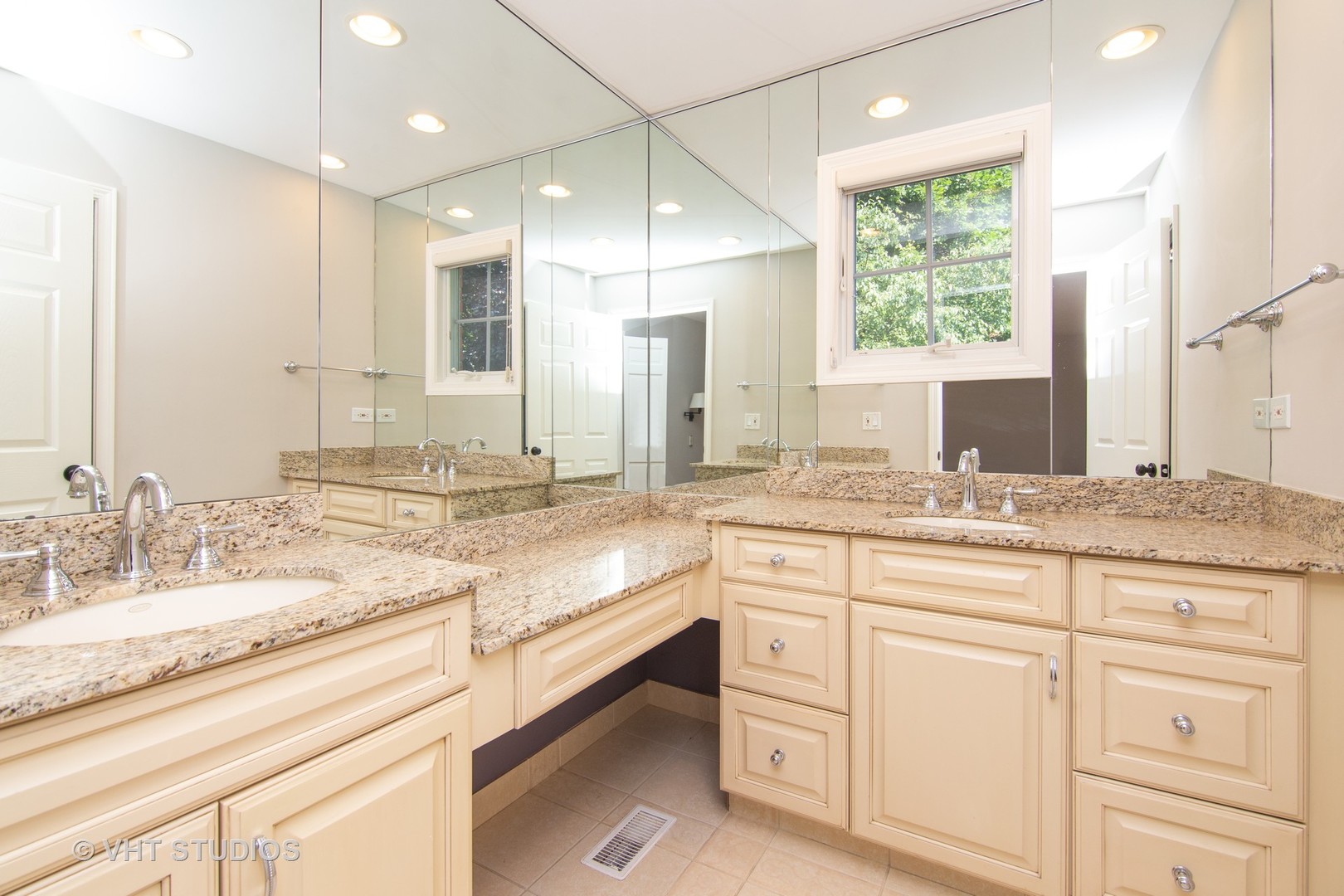 4052 Michelline Lane Northbrook, IL 60062 - Photo 32 of 44 a bathroom with double vanity and a mirror