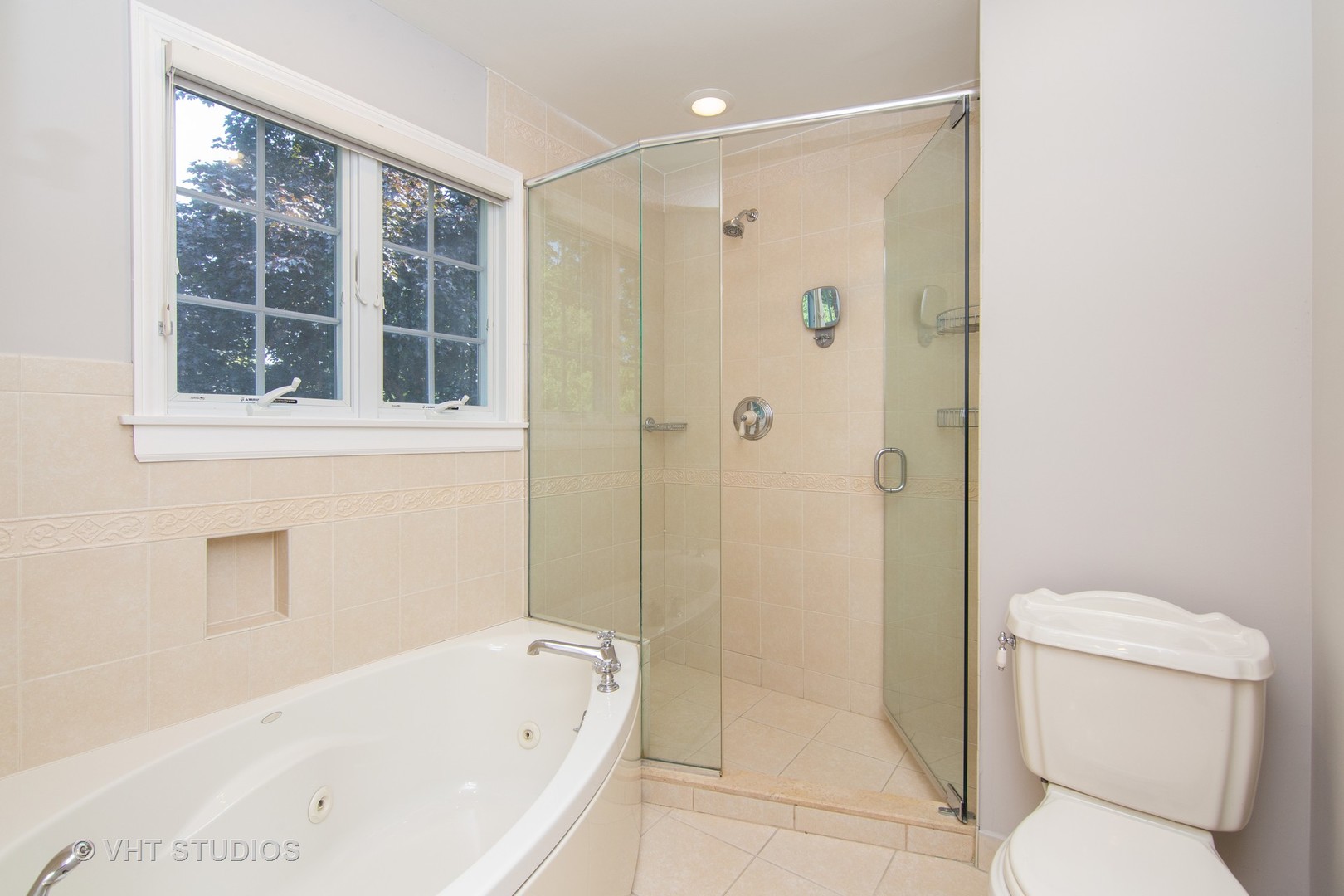 4052 Michelline Lane Northbrook, IL 60062 - Photo 33 of 44 a bathroom with a bathtub and a toilet