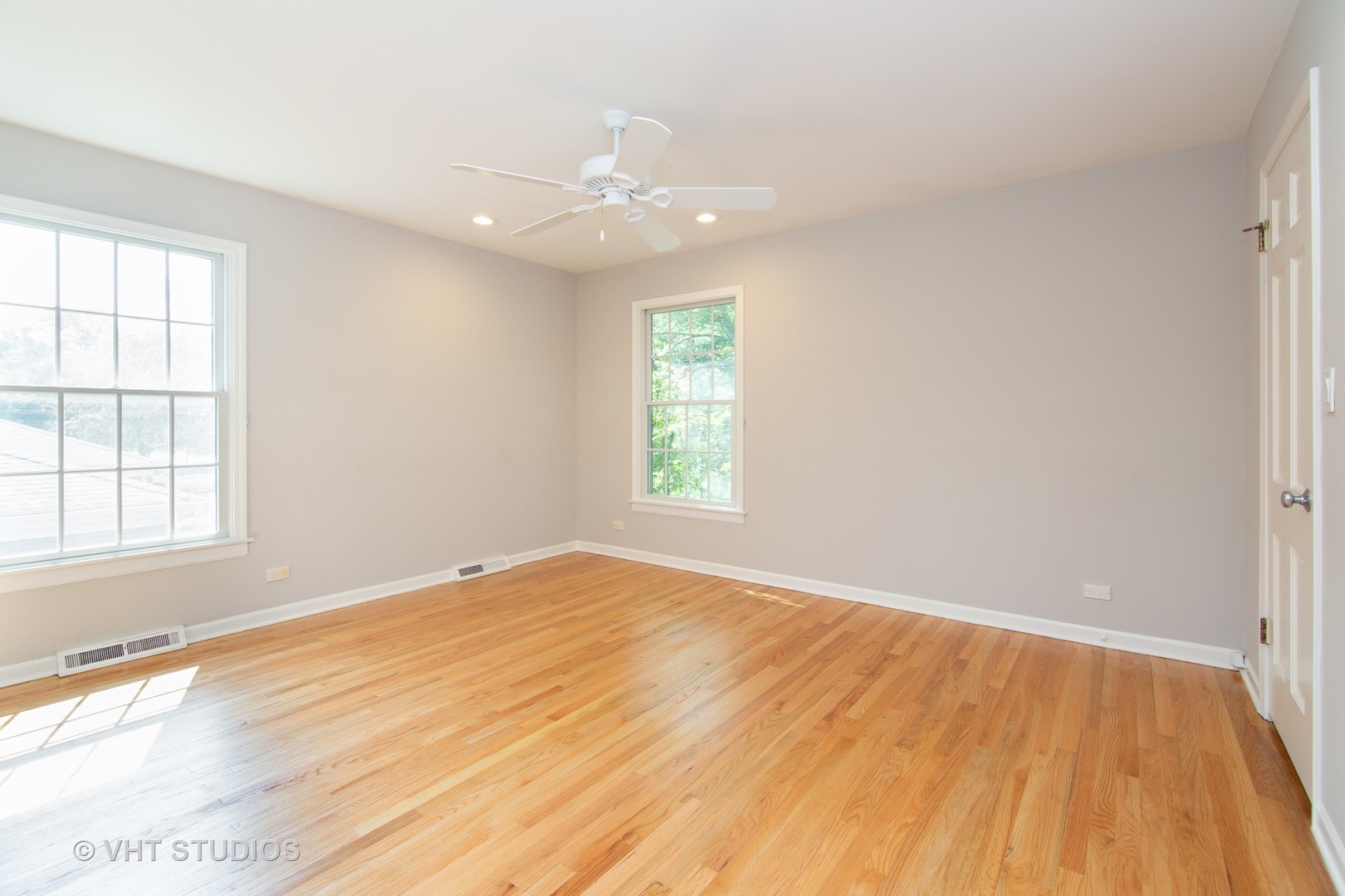4052 Michelline Lane Northbrook, IL 60062 - Photo 36 of 44 an empty room with wooden floor and windows