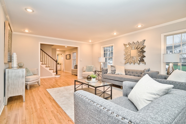 4052 Michelline Lane Northbrook, IL 60062 - Photo 6 of 44 a living room with furniture and a large window