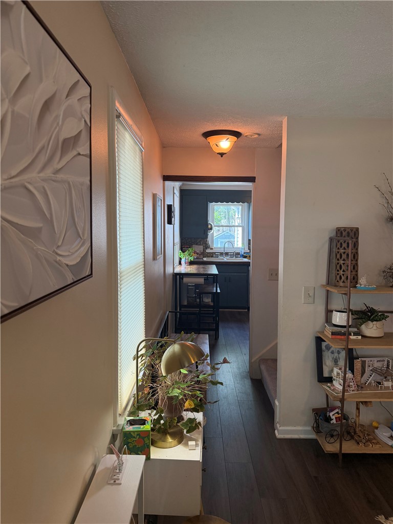 295 Penhurst Road Brighton, NY 14610 - Photo 16 of 32 View from living room into kitchen