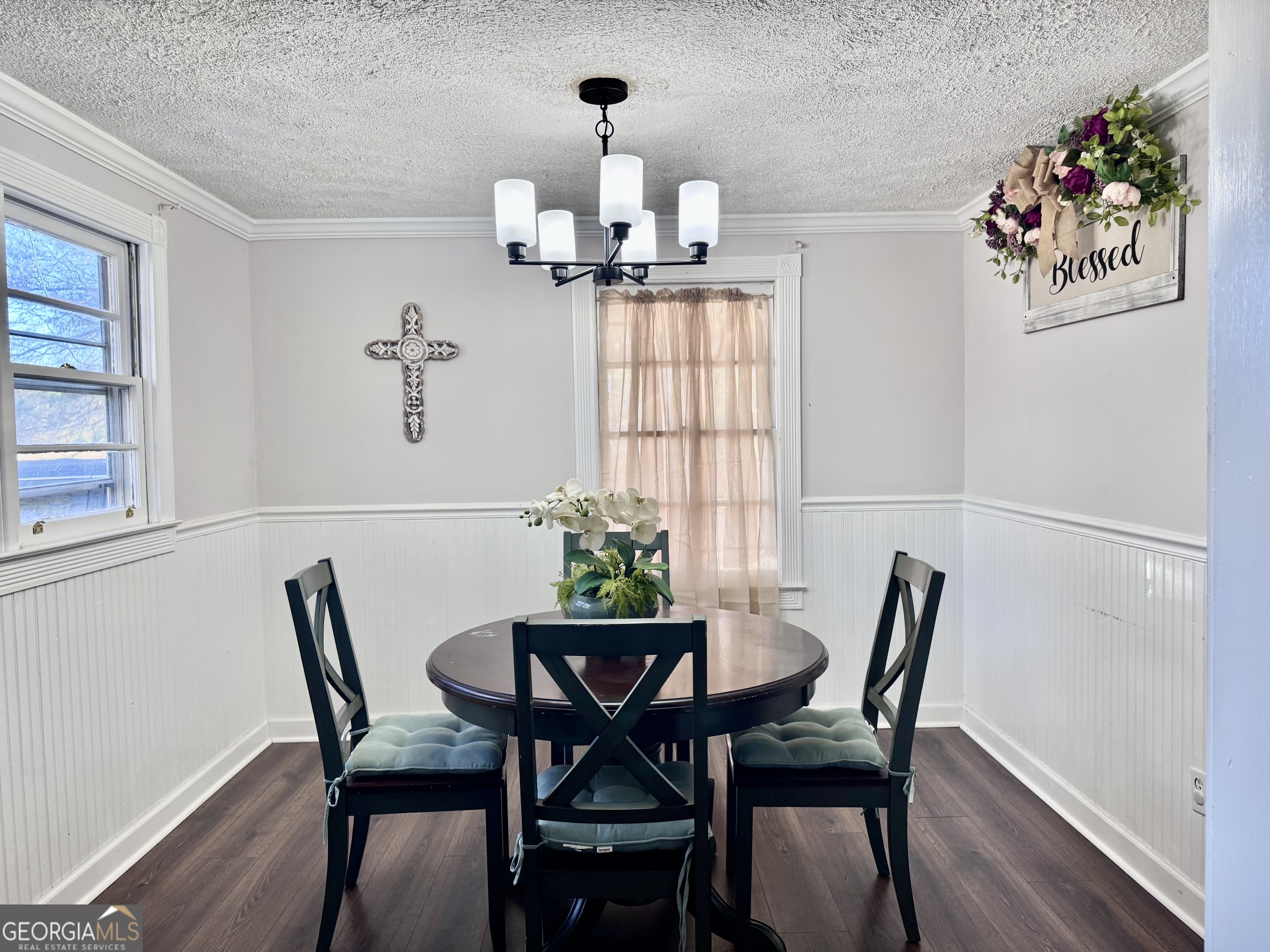 1335 Meadows Boone Road Luthersville, GA 30251 - Photo 7 of 20 a view of a dining room with furniture window and wooden floor