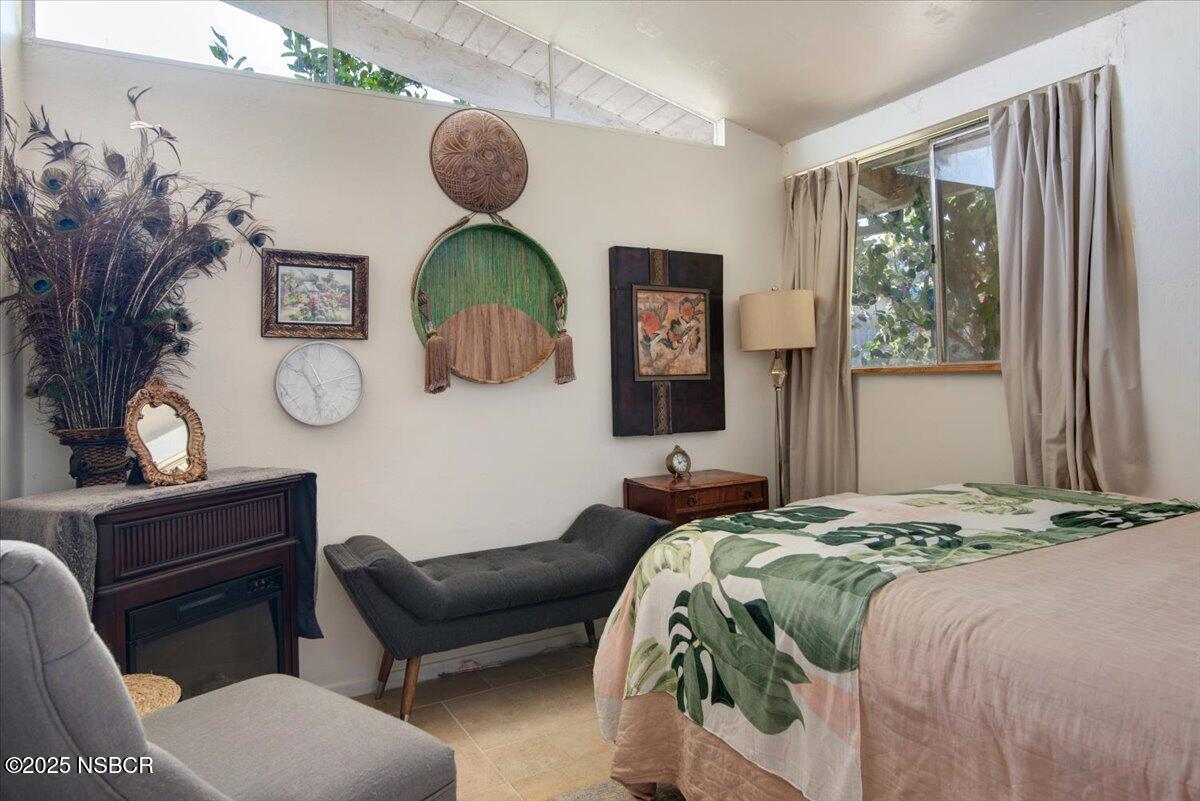 321 North Sixth Street Lompoc, CA 93436 - Photo 17 of 30 a bedroom with bed and a window