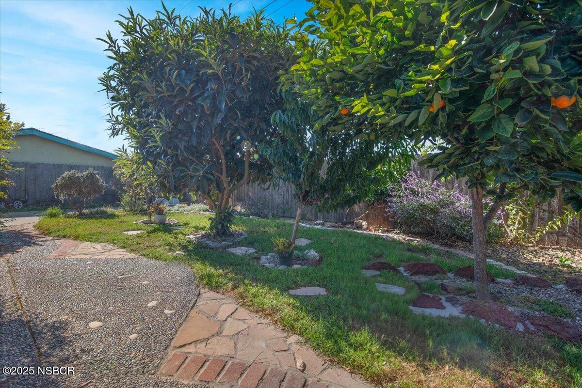 321 North Sixth Street Lompoc, CA 93436 - Photo 22 of 30 a view of backyard with swimming pool