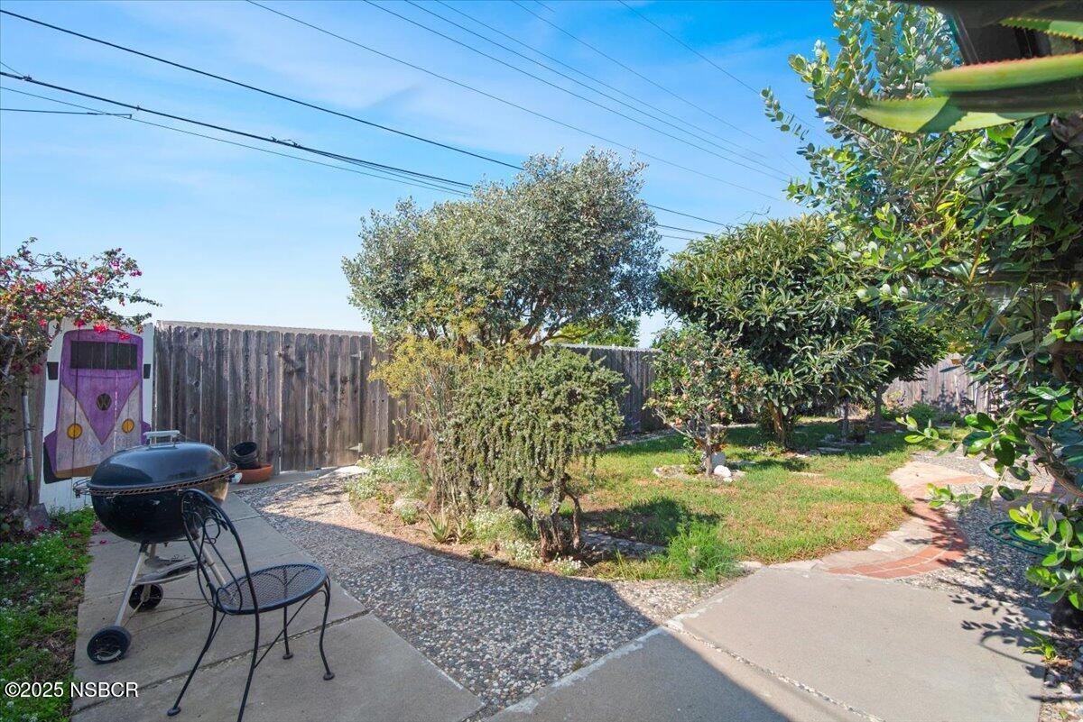 321 North Sixth Street Lompoc, CA 93436 - Photo 25 of 30 a swimming pool with barbeque oven and outdoor seating