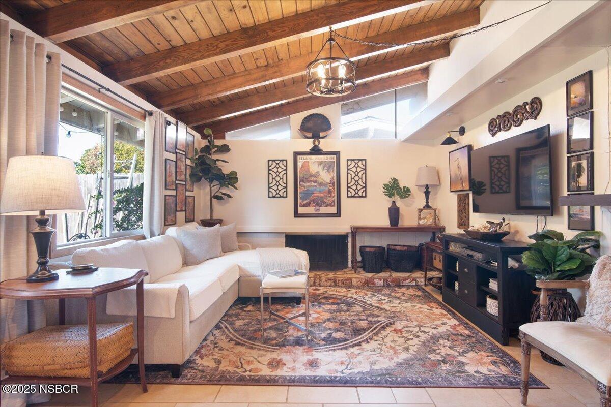 321 North Sixth Street Lompoc, CA 93436 - Photo 3 of 30 a living room with furniture and a flat screen tv