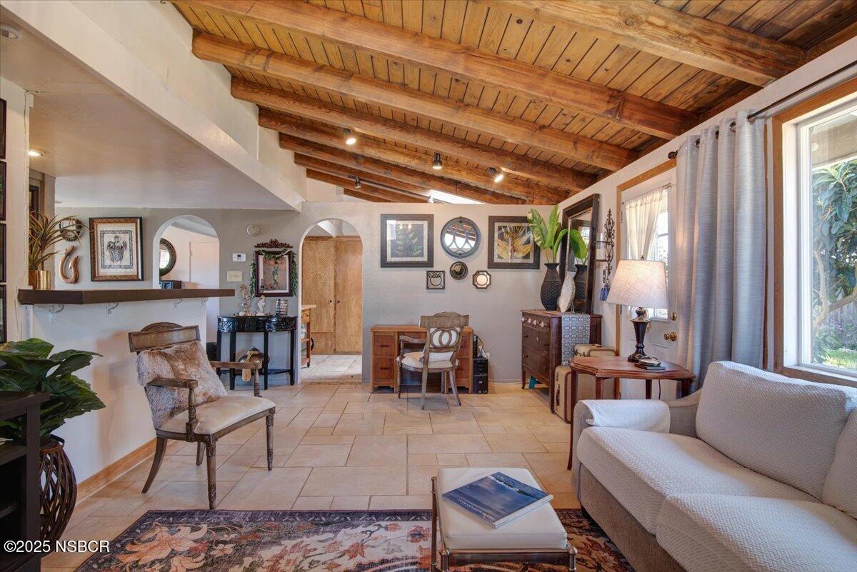 321 North Sixth Street Lompoc, CA 93436 - Photo 4 of 30 a living room with furniture and a large window