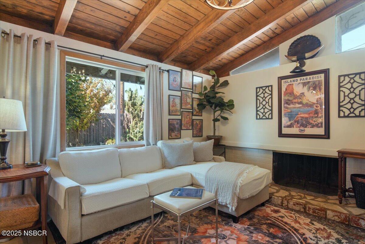 321 North Sixth Street Lompoc, CA 93436 - Photo 7 of 30 a living room with furniture and a large window