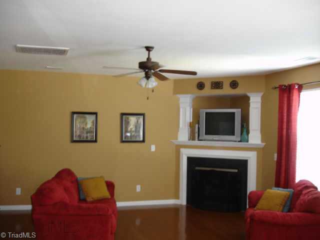 779 Spinning Wheel Point High Point, NC 27265 - Photo 4 of 7 Other. Large family room open to kitchen with wood floors, custom paint and gas log fireplace!
