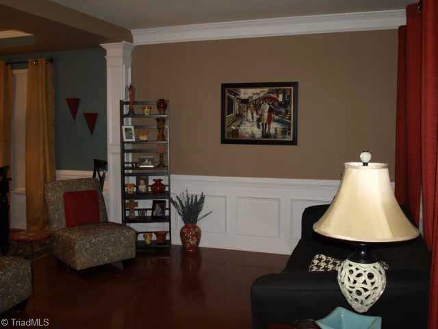 779 Spinning Wheel Point High Point, NC 27265 - Photo 5 of 7 Other. Formal living room with custom paint, wood floors and decorative pillars that separate dining room!