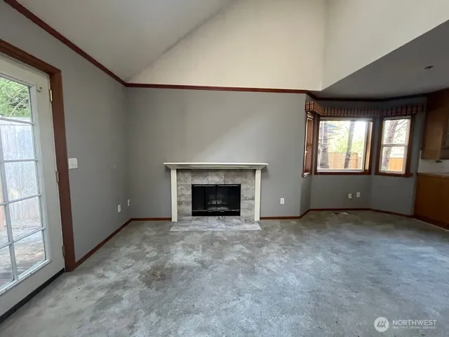 an empty room with windows