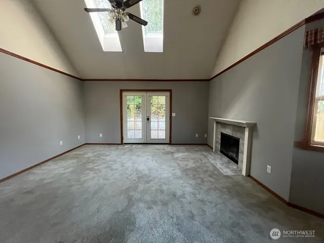 an empty room with windows