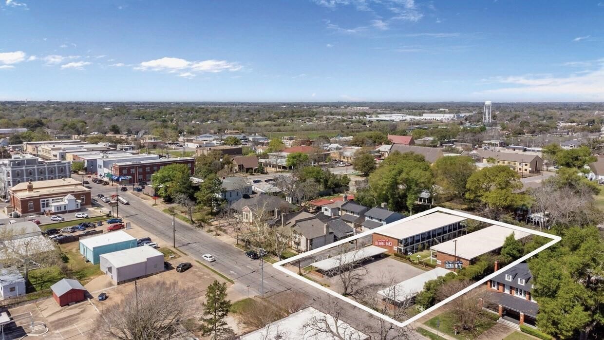 401 East Main Street, Unit 5 Brenham, TX 77833 - Photo 17 of 18 an aerial view of a house with a garden