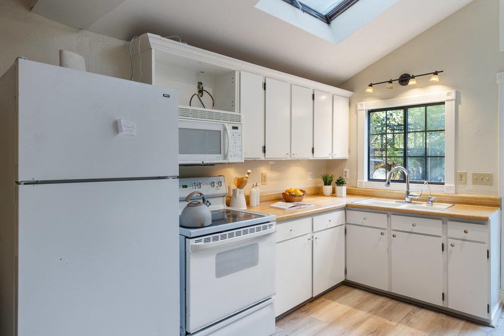 19495 Beardsley Road Los Gatos, CA 95033 - Photo 11 of 63 a kitchen with cabinets a sink and appliances