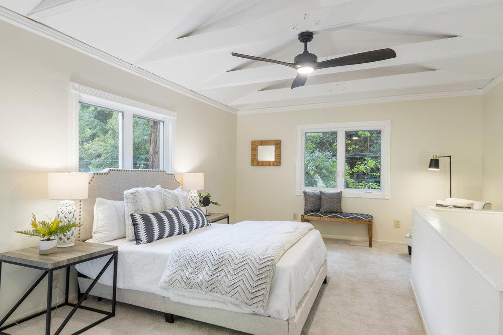 19495 Beardsley Road Los Gatos, CA 95033 - Photo 17 of 63 a bedroom with a bed and a table