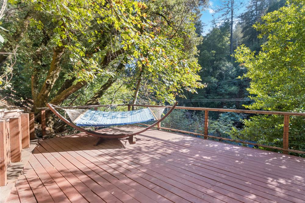 19495 Beardsley Road Los Gatos, CA 95033 - Photo 3 of 63 a view of a backyard with plants and trees