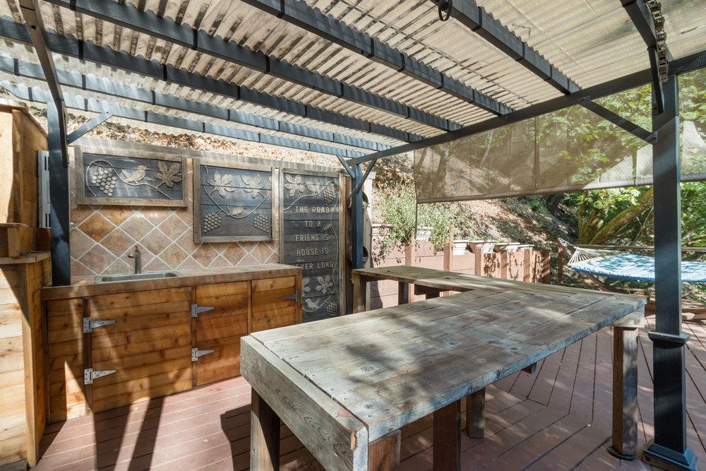 19495 Beardsley Road Los Gatos, CA 95033 - Photo 41 of 63 a view of an outdoor dining space with furniture