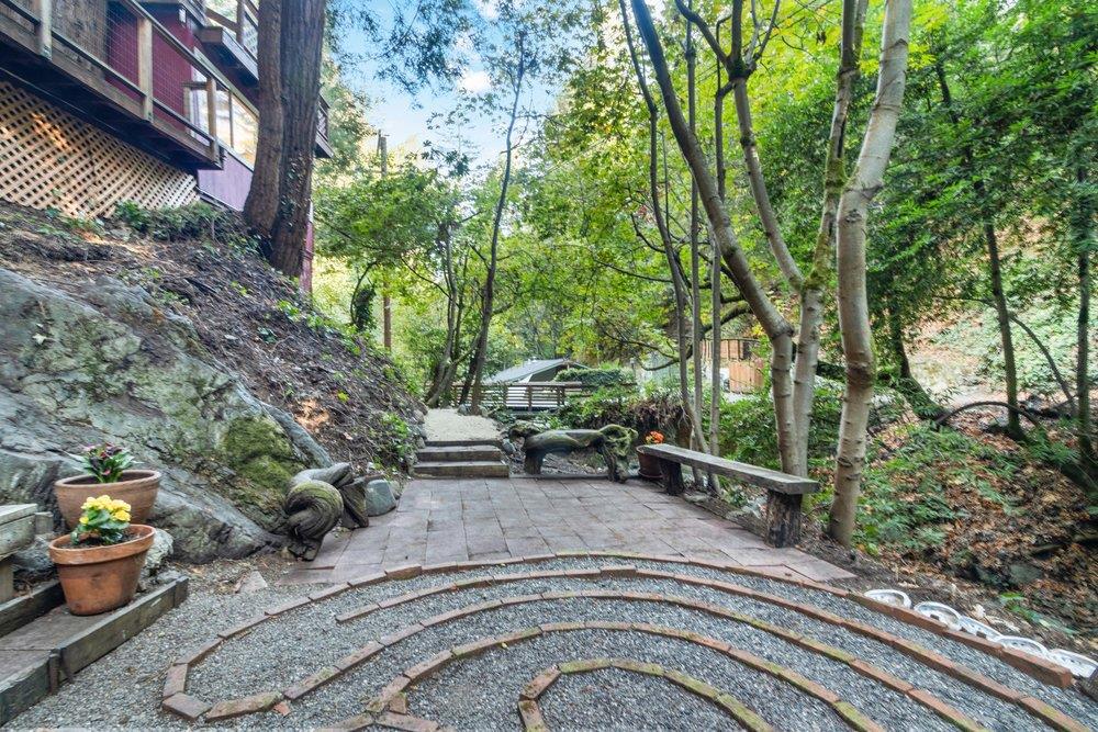 19495 Beardsley Road Los Gatos, CA 95033 - Photo 51 of 63 a view of backyard with table and chairs potted plants and large tree