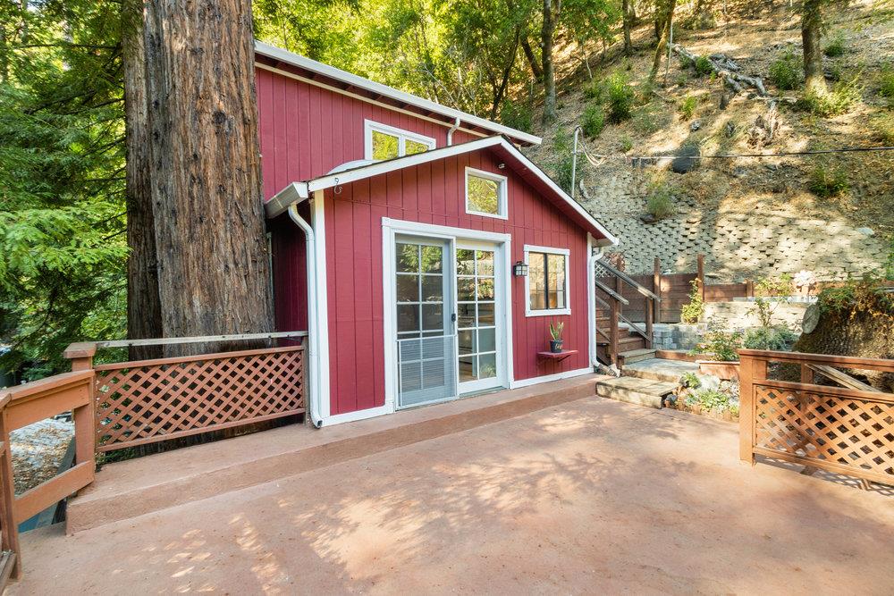 19495 Beardsley Road Los Gatos, CA 95033 - Photo 56 of 63 a view of a house with a yard and wooden fence