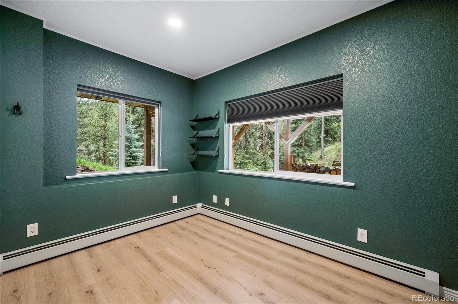 6747 South Brook Forest Road Evergreen, CO 80439 - Photo 32 of 49 a view of a room that has a window