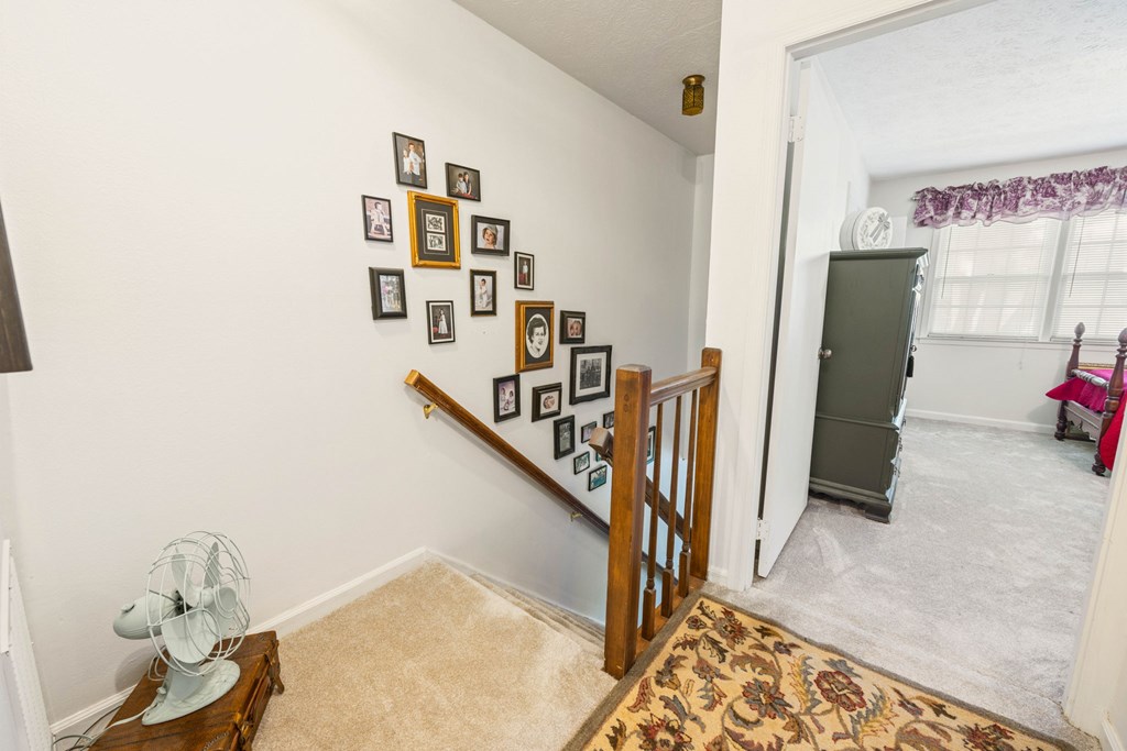6101 River Road, Unit 15 Columbus, GA 31904 - Photo 17 of 22 a view of livingroom with furniture and stairs