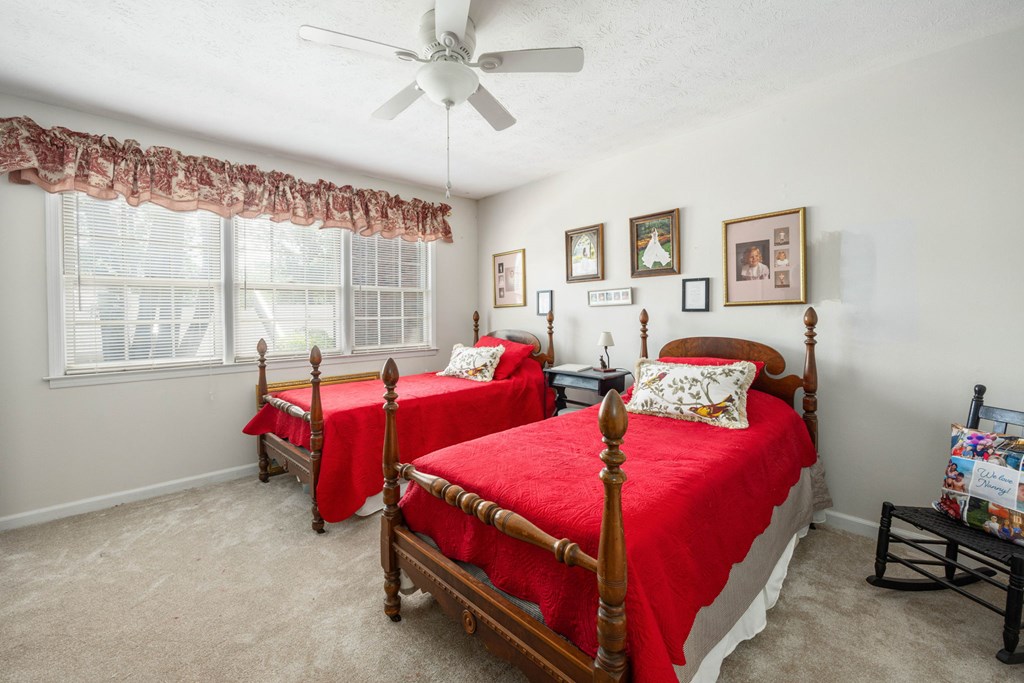 6101 River Road, Unit 15 Columbus, GA 31904 - Photo 18 of 22 a bedroom with two beds and a window