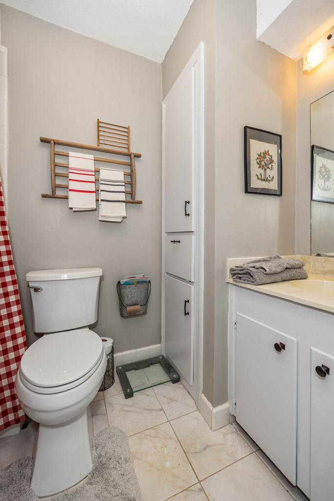 6101 River Road, Unit 15 Columbus, GA 31904 - Photo 19 of 22 a bathroom with a toilet sink and shower