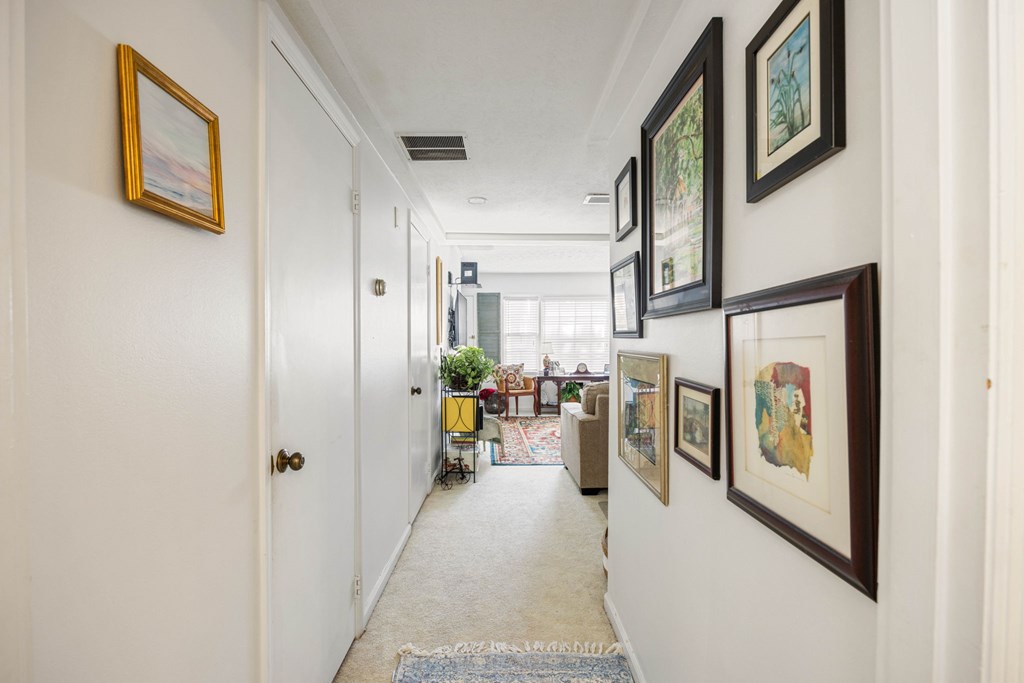 6101 River Road, Unit 15 Columbus, GA 31904 - Photo 8 of 22 a view of a hallway with dining area
