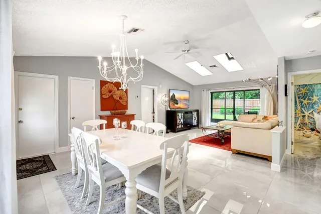 a kitchen with a refrigerator stove and sink
