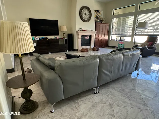a view of a dining room with furniture and window