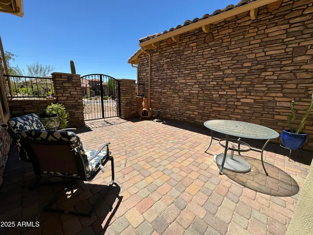a view of a backyard with a small pool
