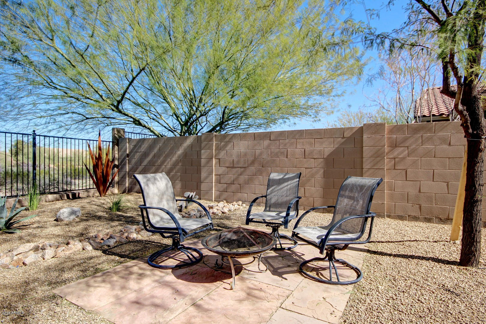 17588 West Verdin Road Goodyear, AZ 85338 - Photo 33 of 38 Backyard Sitting Area