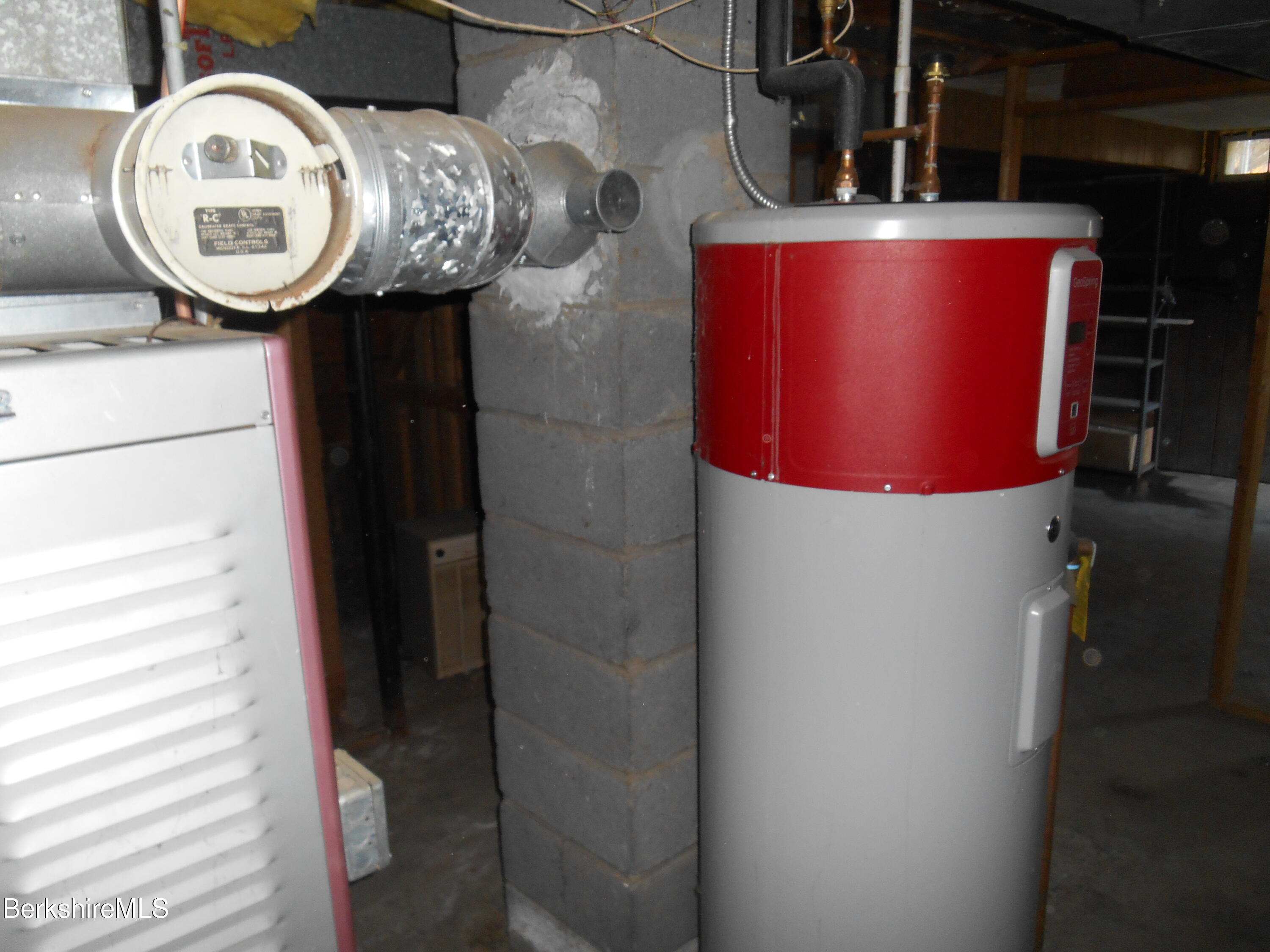 14 Glassworks Road Lanesborough, MA 01224 - Photo 22 of 23 a bathroom with a sink and a mirror