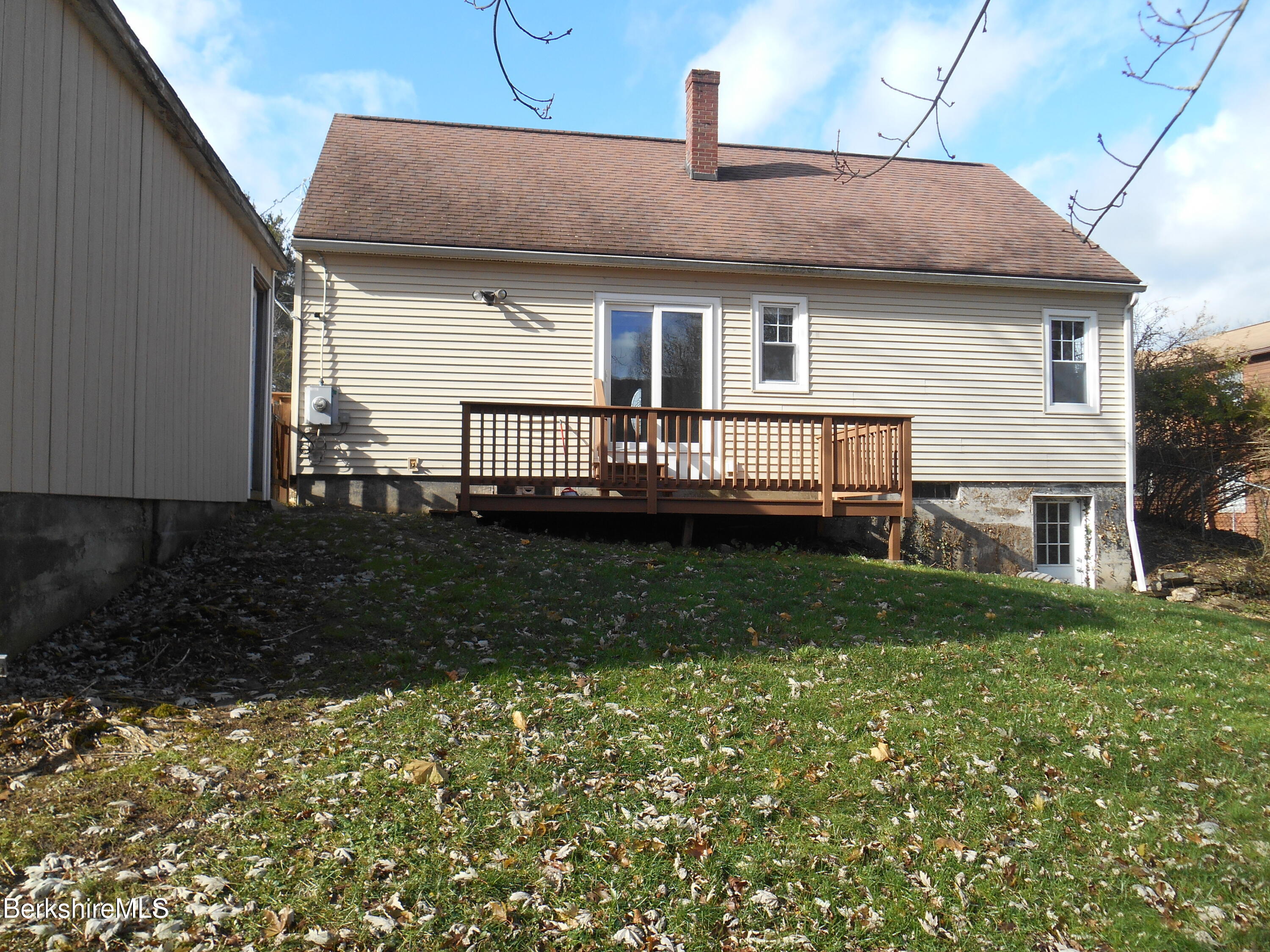 14 Glassworks Road Lanesborough, MA 01224 - Photo 3 of 23 a view of a house next to a yard