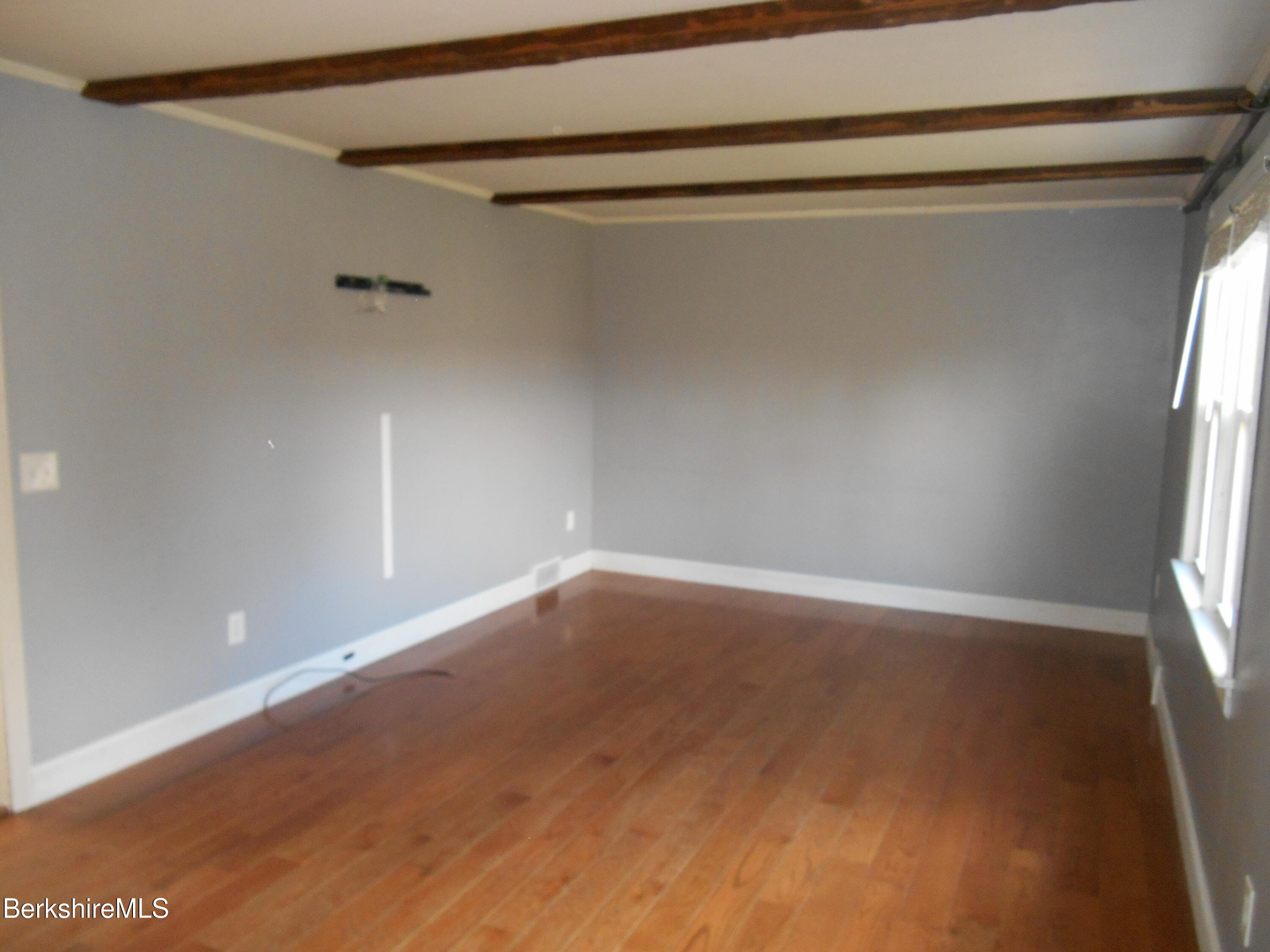 14 Glassworks Road Lanesborough, MA 01224 - Photo 7 of 23 a view of an empty room