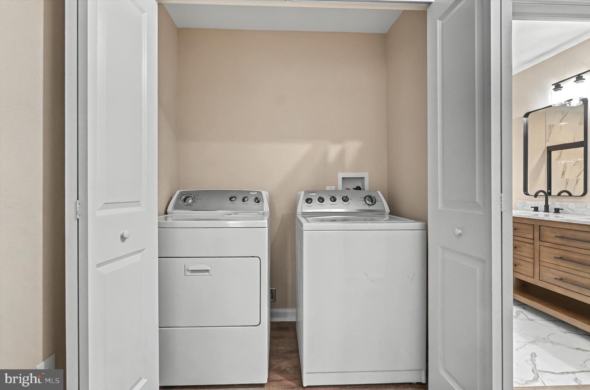 1853 Eastern Boulevard York, PA 17402 - Photo 15 of 38 a utility room with dryer and washer