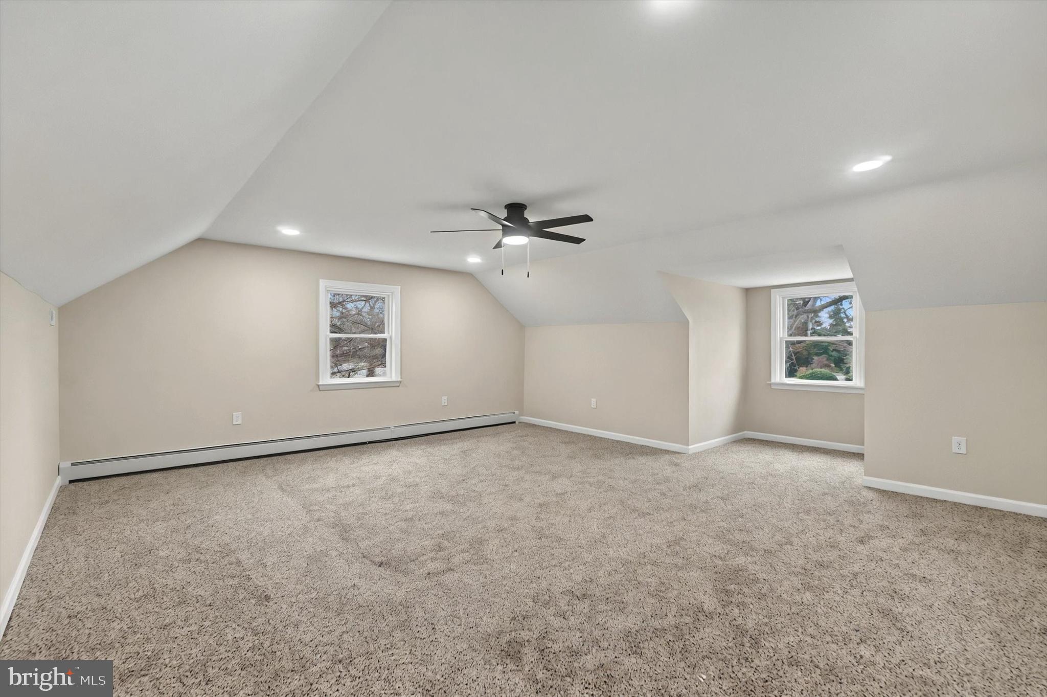 1853 Eastern Boulevard York, PA 17402 - Photo 21 of 38 an empty room with windows and ceiling fan