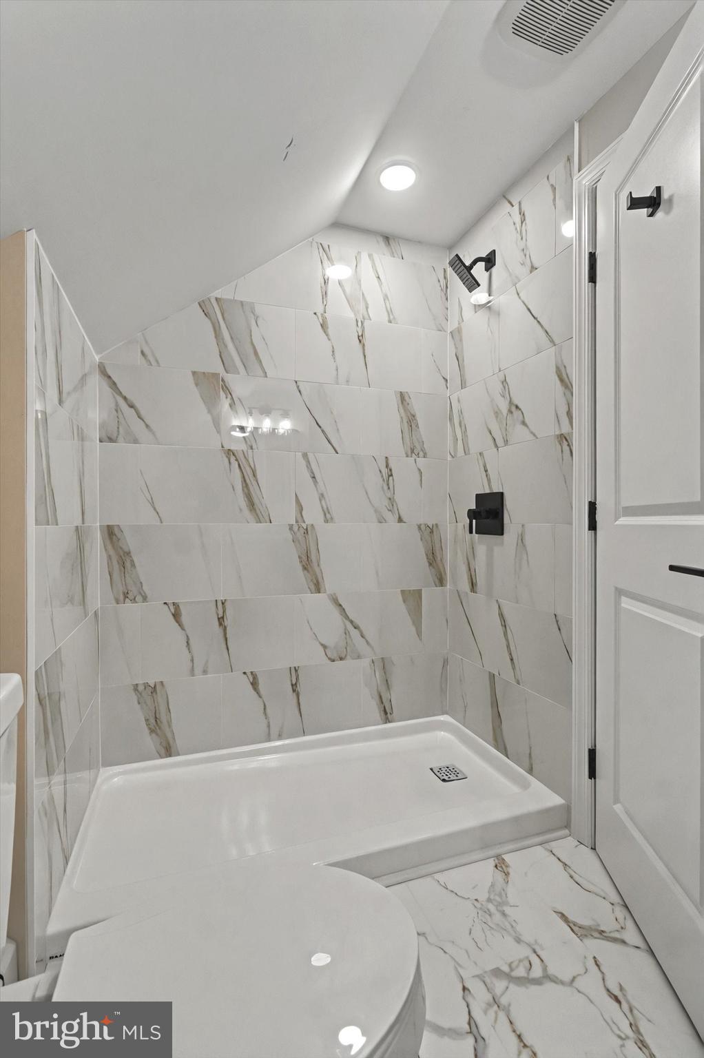 1853 Eastern Boulevard York, PA 17402 - Photo 27 of 38 a bathroom with a bathtub and a shower