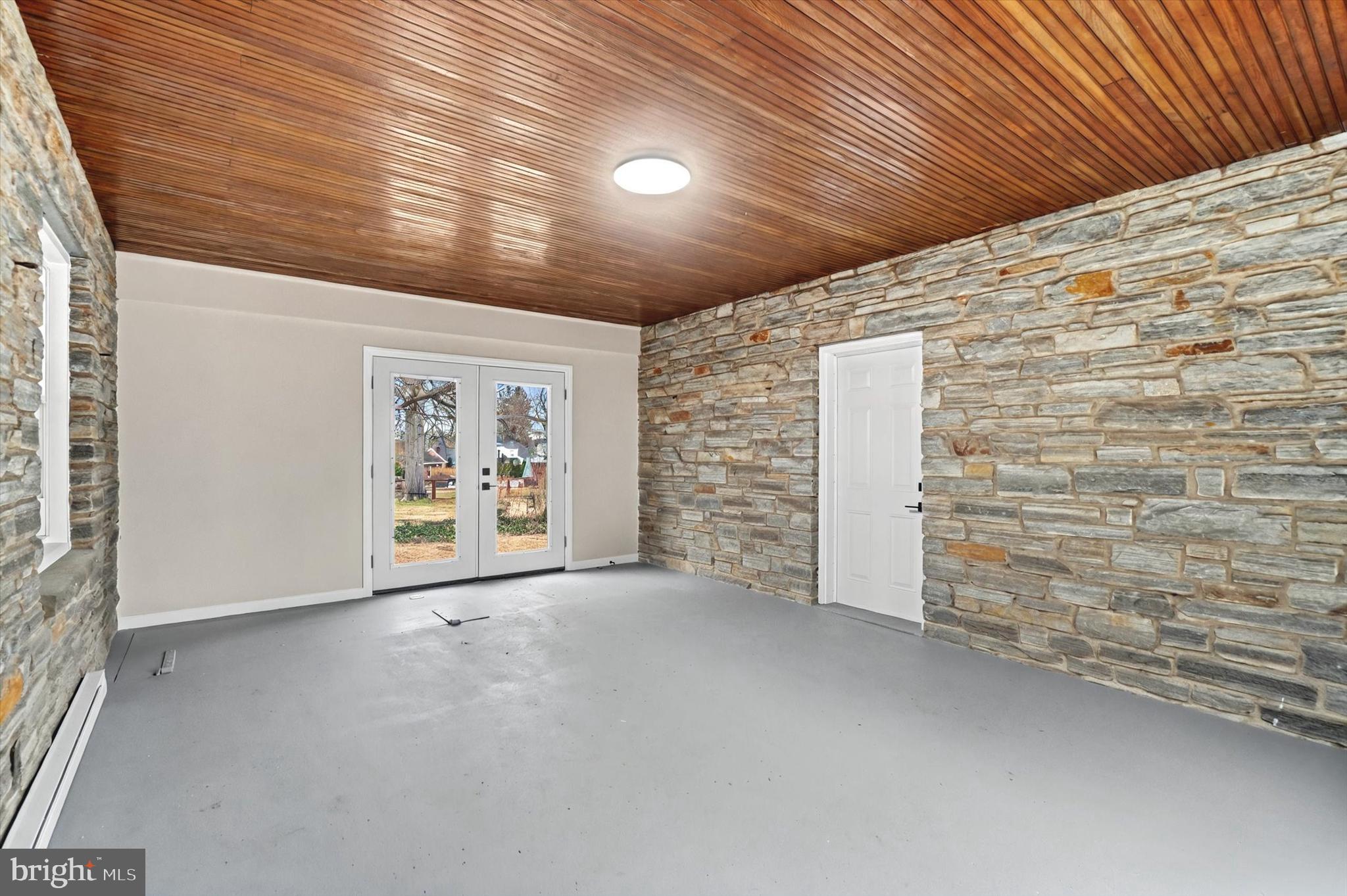 1853 Eastern Boulevard York, PA 17402 - Photo 32 of 38 a view of an empty room with a white wall and a window