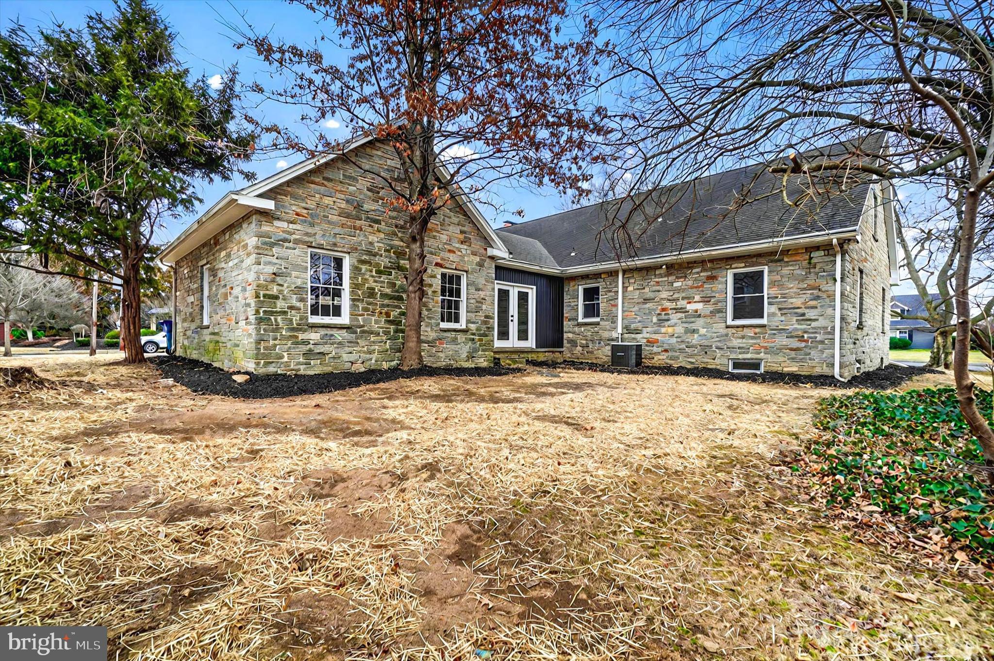 1853 Eastern Boulevard York, PA 17402 - Photo 34 of 38 a front view of house with yard and trees around