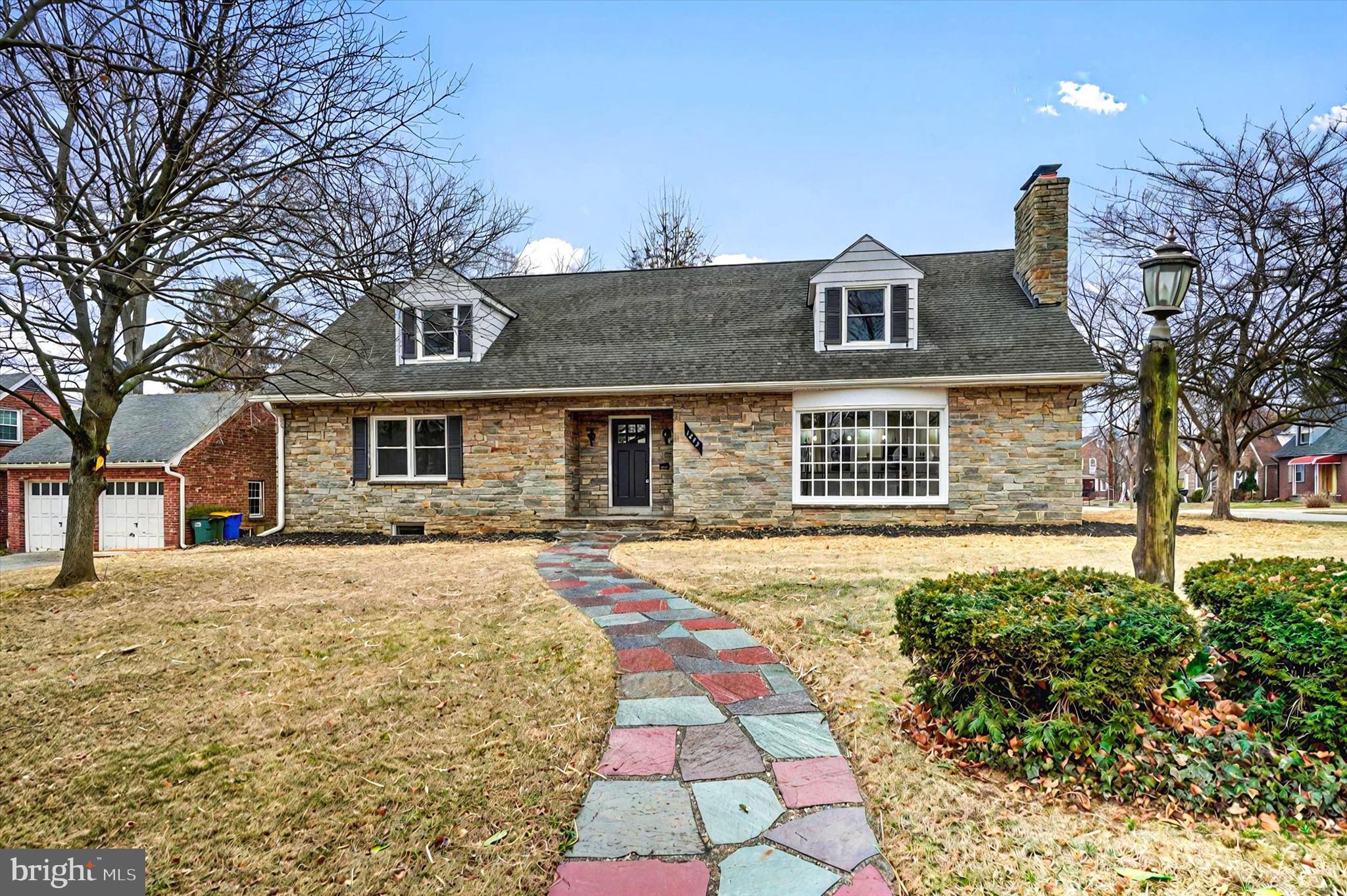 1853 Eastern Boulevard York, PA 17402 - Photo 38 of 38 a front view of a house with a yard and garage