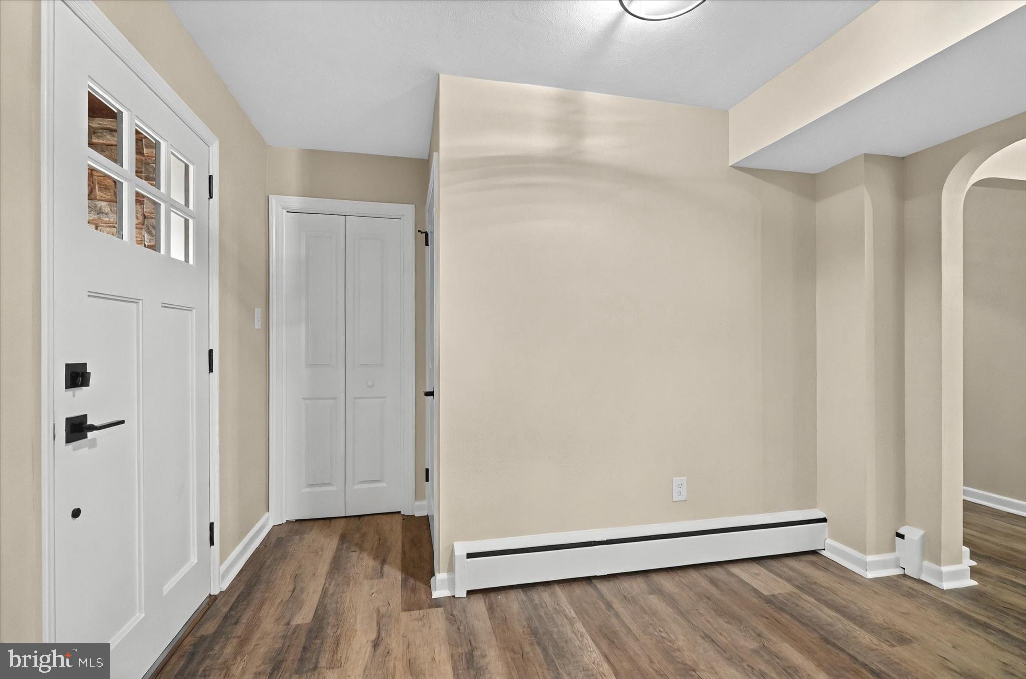 1853 Eastern Boulevard York, PA 17402 - Photo 10 of 38 a view of an empty room with wooden floor and a window
