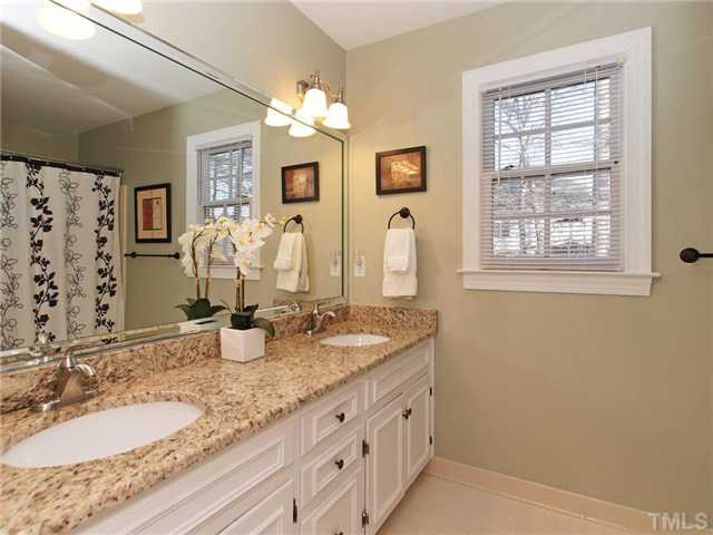 8316 Apple Orchard Way Raleigh, NC 27615 - Photo 16 of 25 Large full bath with double vanity featuring new granite, lights, faucets! Bathroom