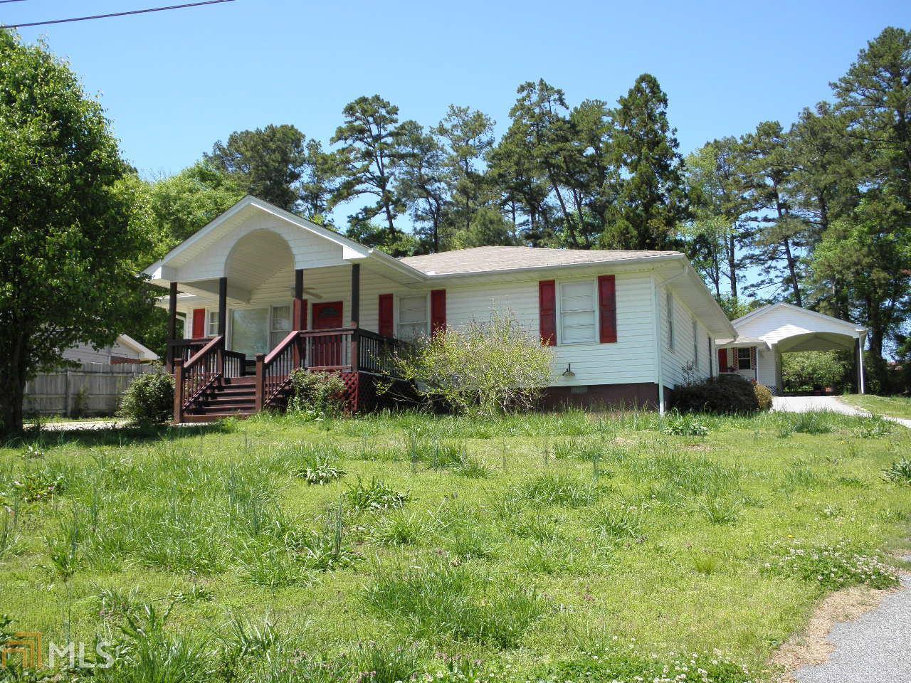 114 Thornton Road Winder, GA 30680 - Photo 1 of 1 a view of backyard of house with green space