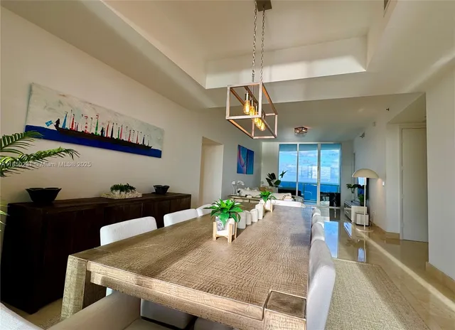 a view of a dining room and livingroom furniture