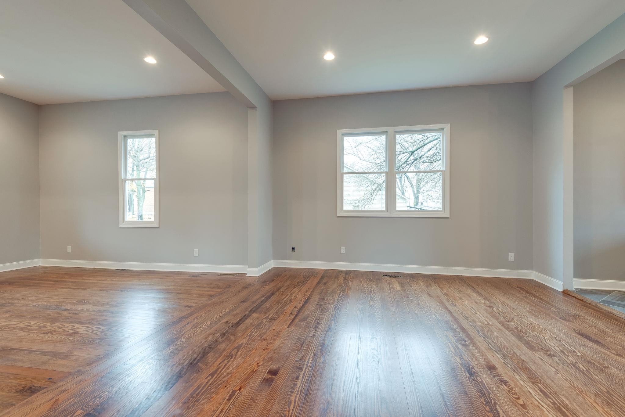 1012 Cheatham Street Springfield, TN 37172 - Photo 16 of 25 an empty room with wooden floor and windows