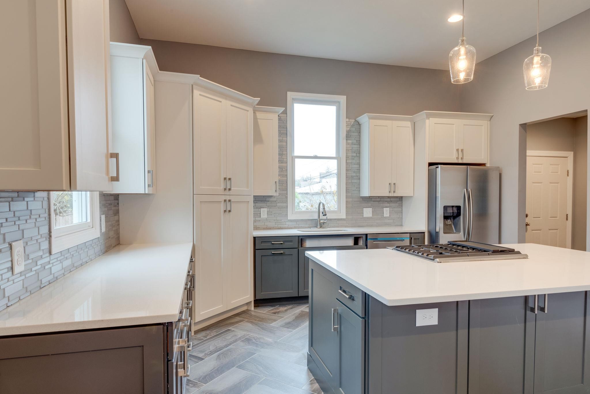 1012 Cheatham Street Springfield, TN 37172 - Photo 4 of 25 a kitchen with a sink and a refrigerator