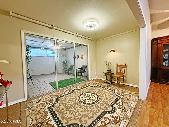 a bedroom with a bed and a table